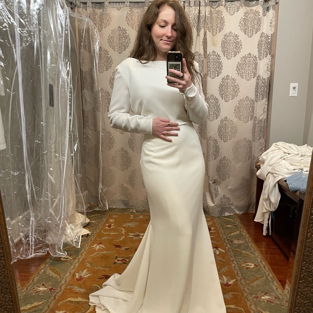 NEW WEDDING DRESS. Never worn.
